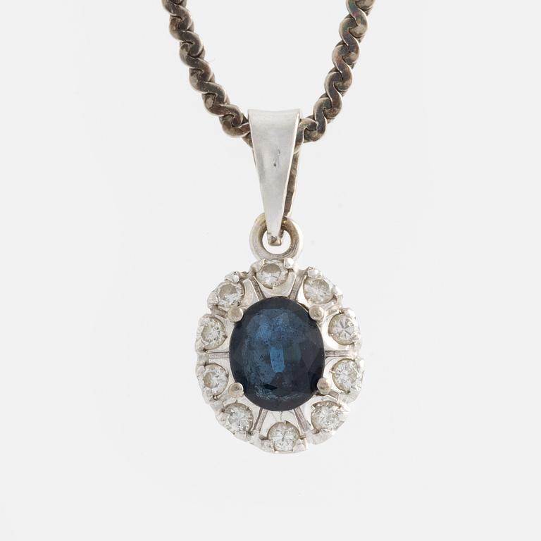 Pendant and a pair of earrings, white gold with sapphires and brilliant-cut diamonds.