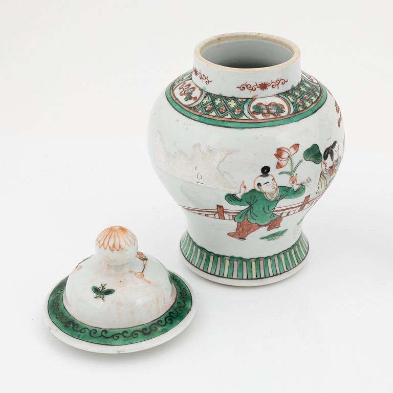 A Chinese dinner plate and a Japanese imari bowl, 18th Century together with a Chinese 19th Century jar with cover.