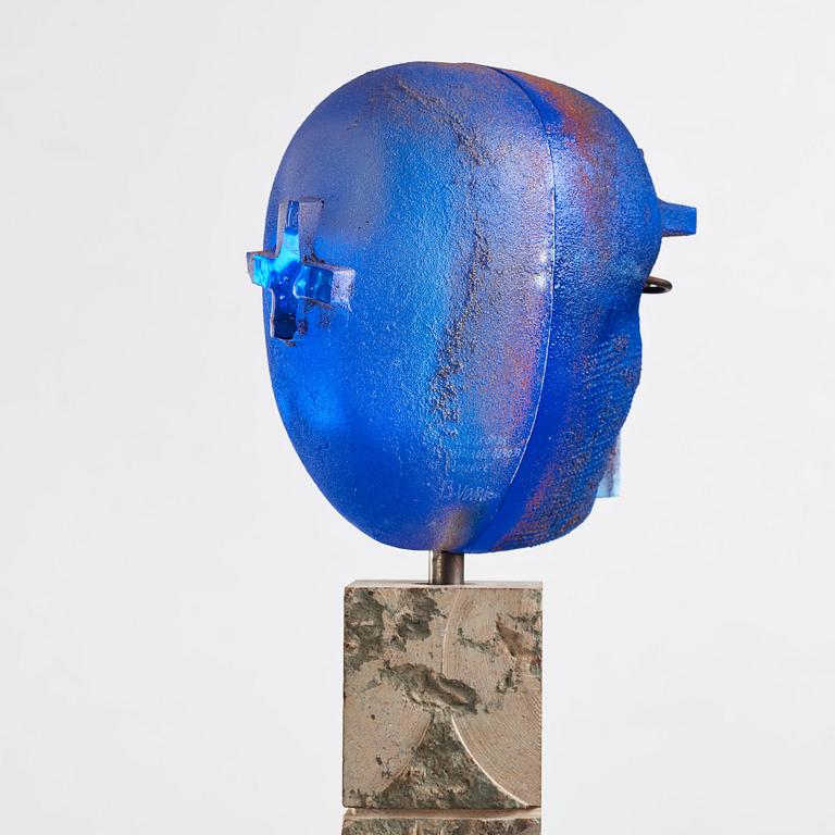 Bertil Vallien, a unique sand casted blue glass 'Head' sculpture on a hewn and polished limestone plinth, Kosta Boda, Sweden.