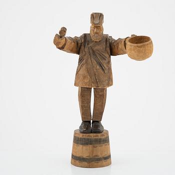 Axel Petersson Döderhultarn, skulptur, signerad. Delvis bemålat trä, höjd 34 cm.