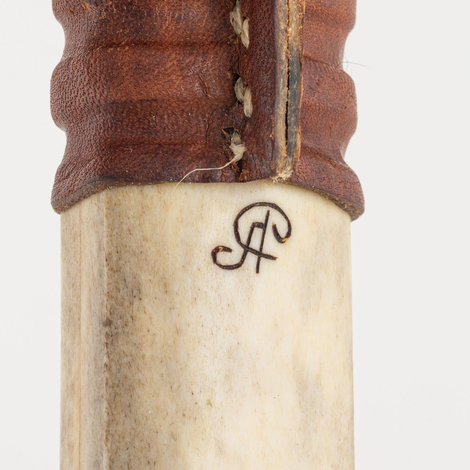 Andreas Poggats a reindeer horn knife, signed.