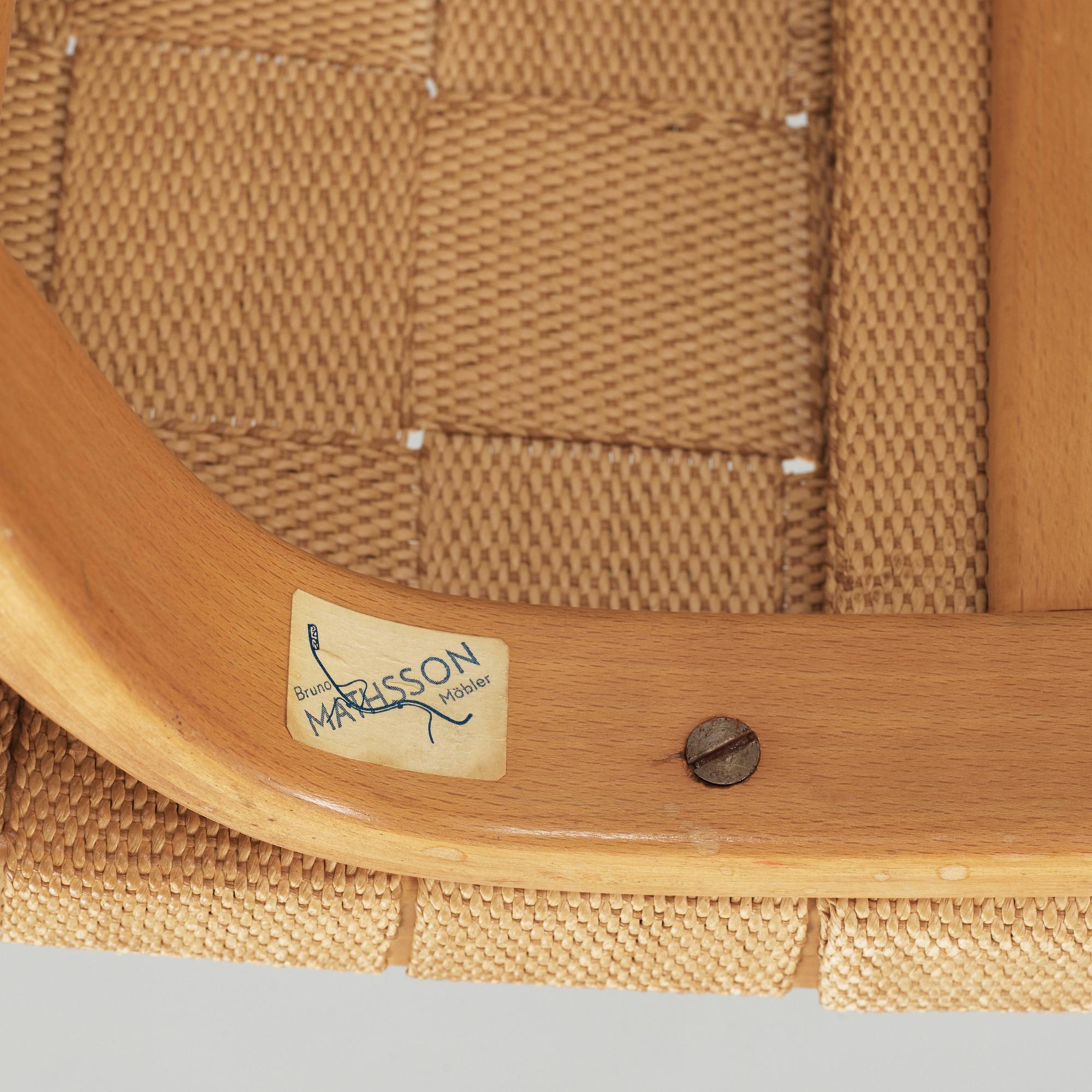 A Bruno Mathsson Swedish Modern chair with attached reading table, Karl Mathsson, Värnamo 1944.