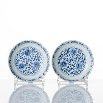 A set of nine blue and white lotus dishes, Qing dynasty with Daoguang seal mark.