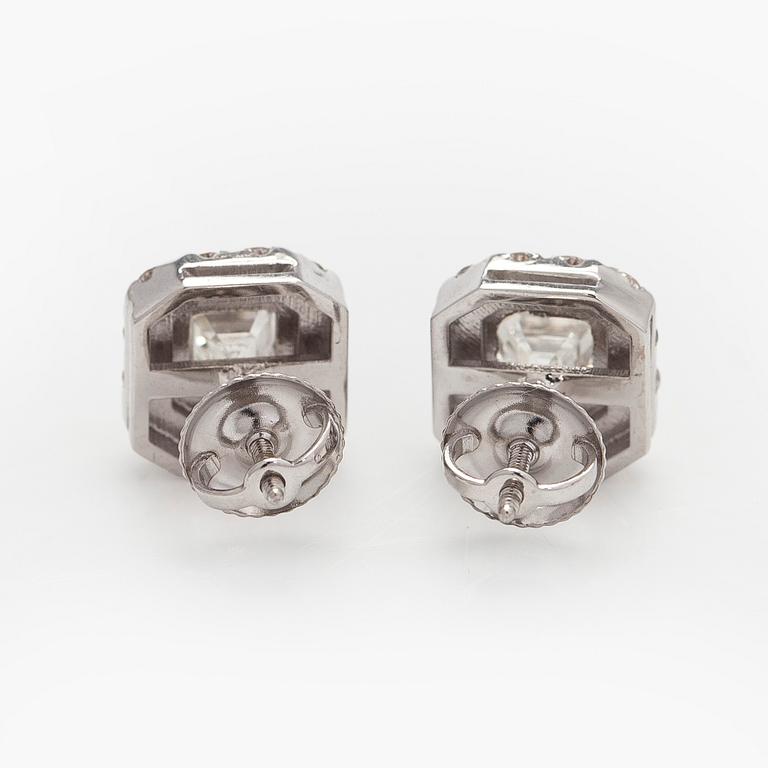 Earrings, emerald cut diamonds 0.70 ct / each and brilliant cut diamonds, 18K white gold.