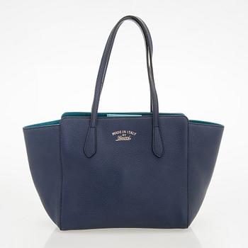 Gucci, a 'Swing Tote' bag.