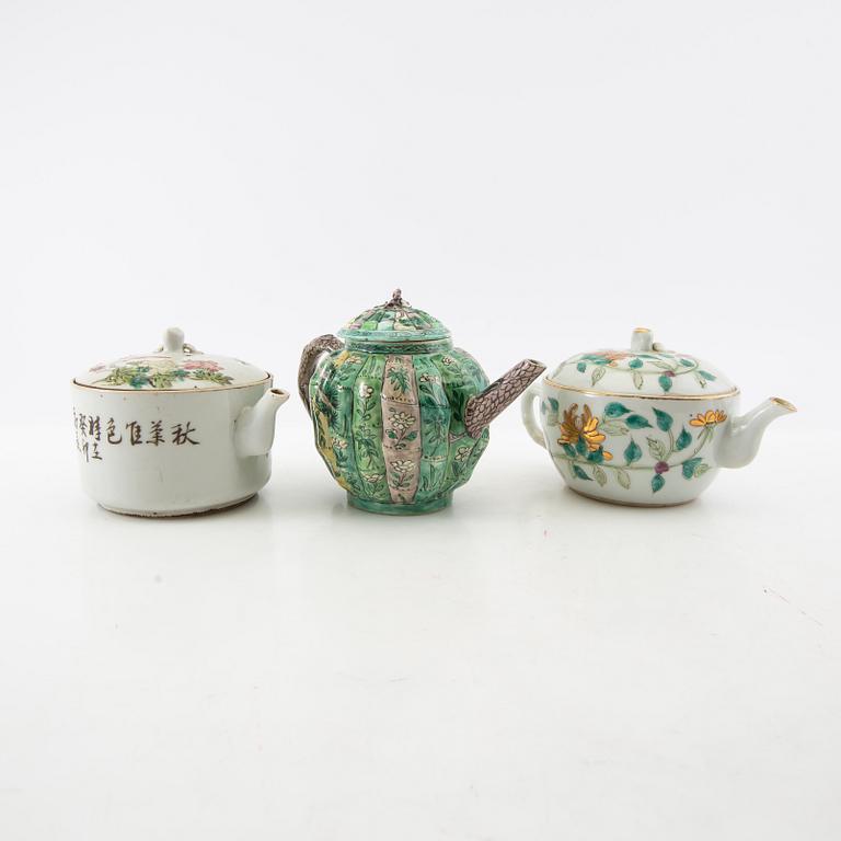 A set of three differently decorated tea pots with covers, Qing dynasty, 18century and 20th century.