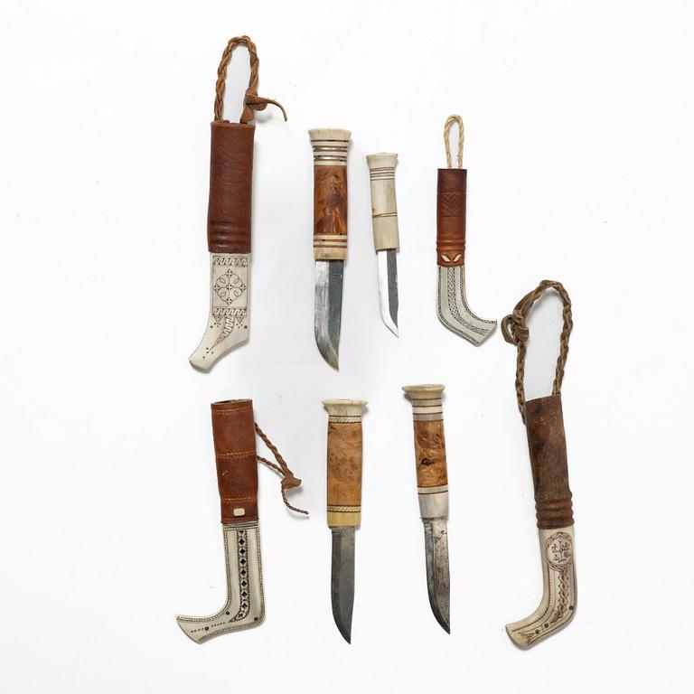 Eight knives, of which seven are half-horn knives, signed.