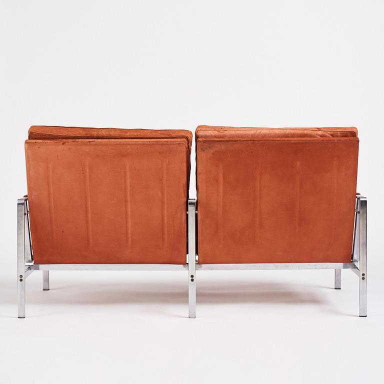 Preben Fabricius & Jørgen Kastholm, a two-seated brown leather sofa, Kill International, Germany 1960s.