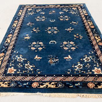 An old Chinese carpet ca 290x200 cm.