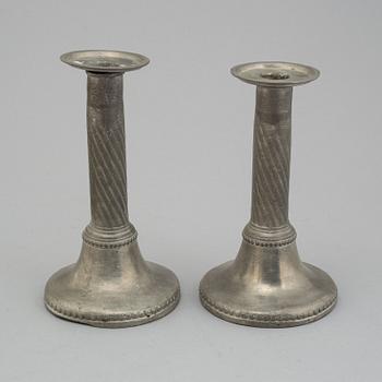 A pair of gustavian pewter candlesticks by Eric Pettersson Krietz, Stockholm 1788.