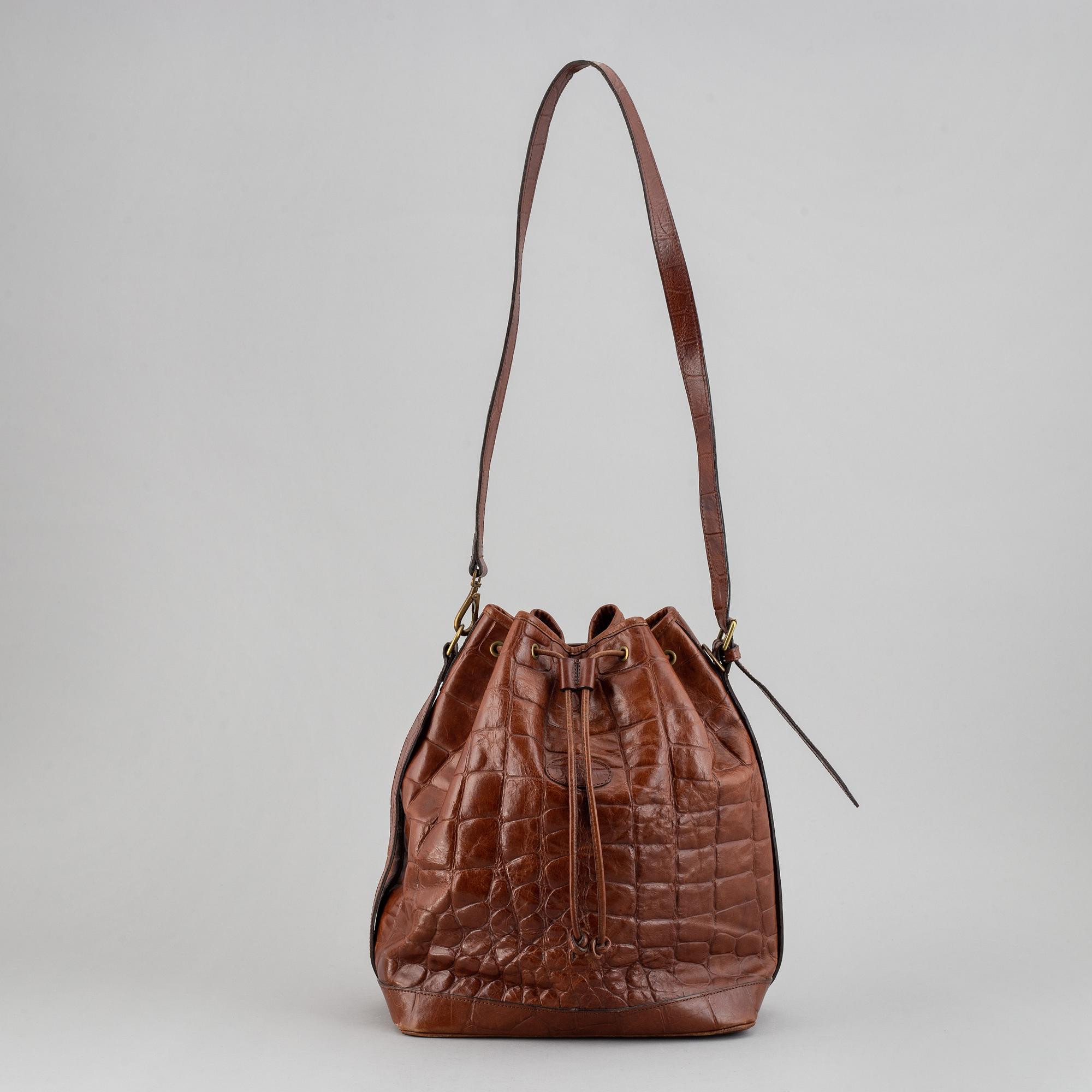 MULBERRY, a leather drawstring bag.