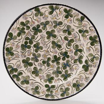 A stoneware decorative dish signed Kaipiainen.