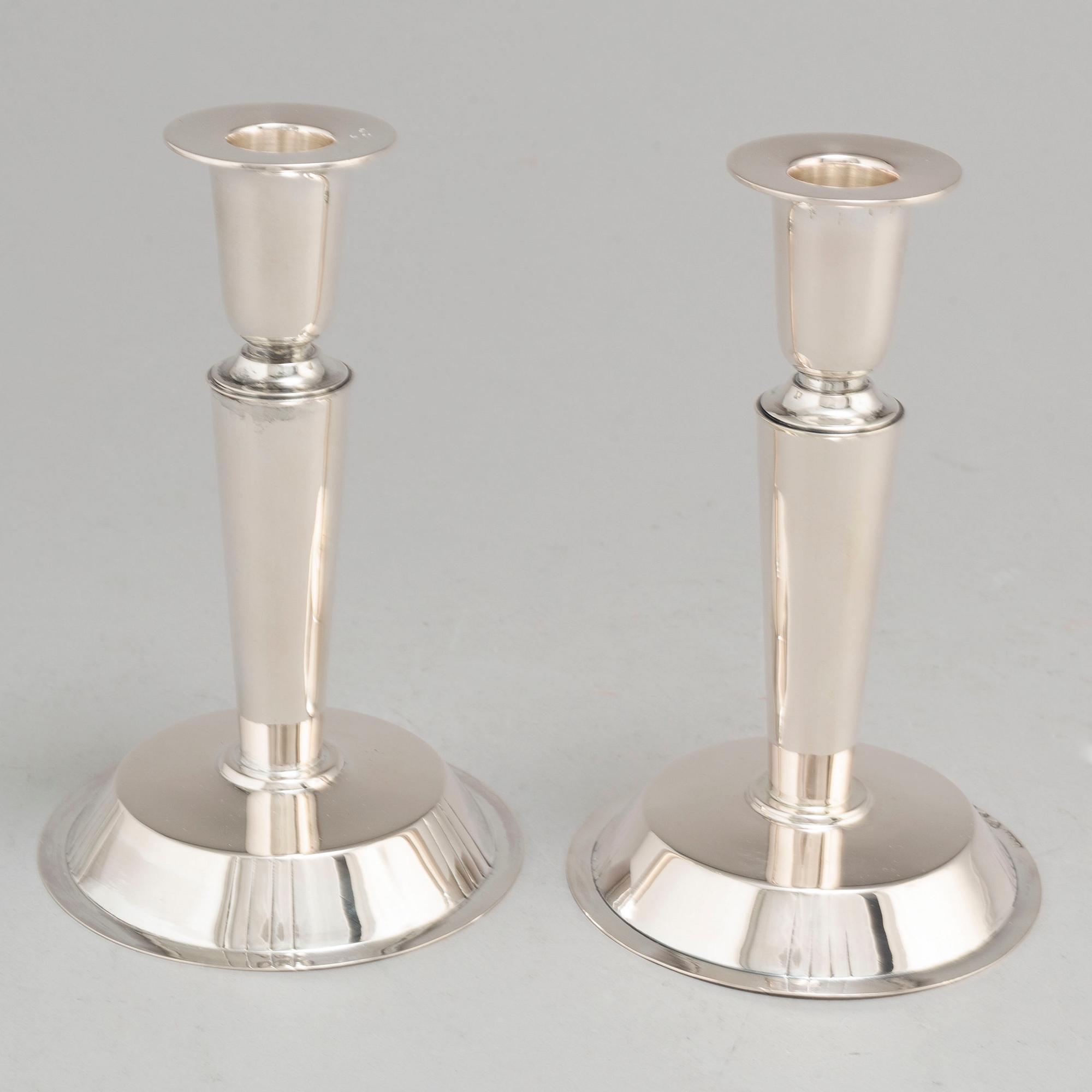 ERIC RÅSTRÖM, a pair of silver candlesticks, Stockholm 1954.