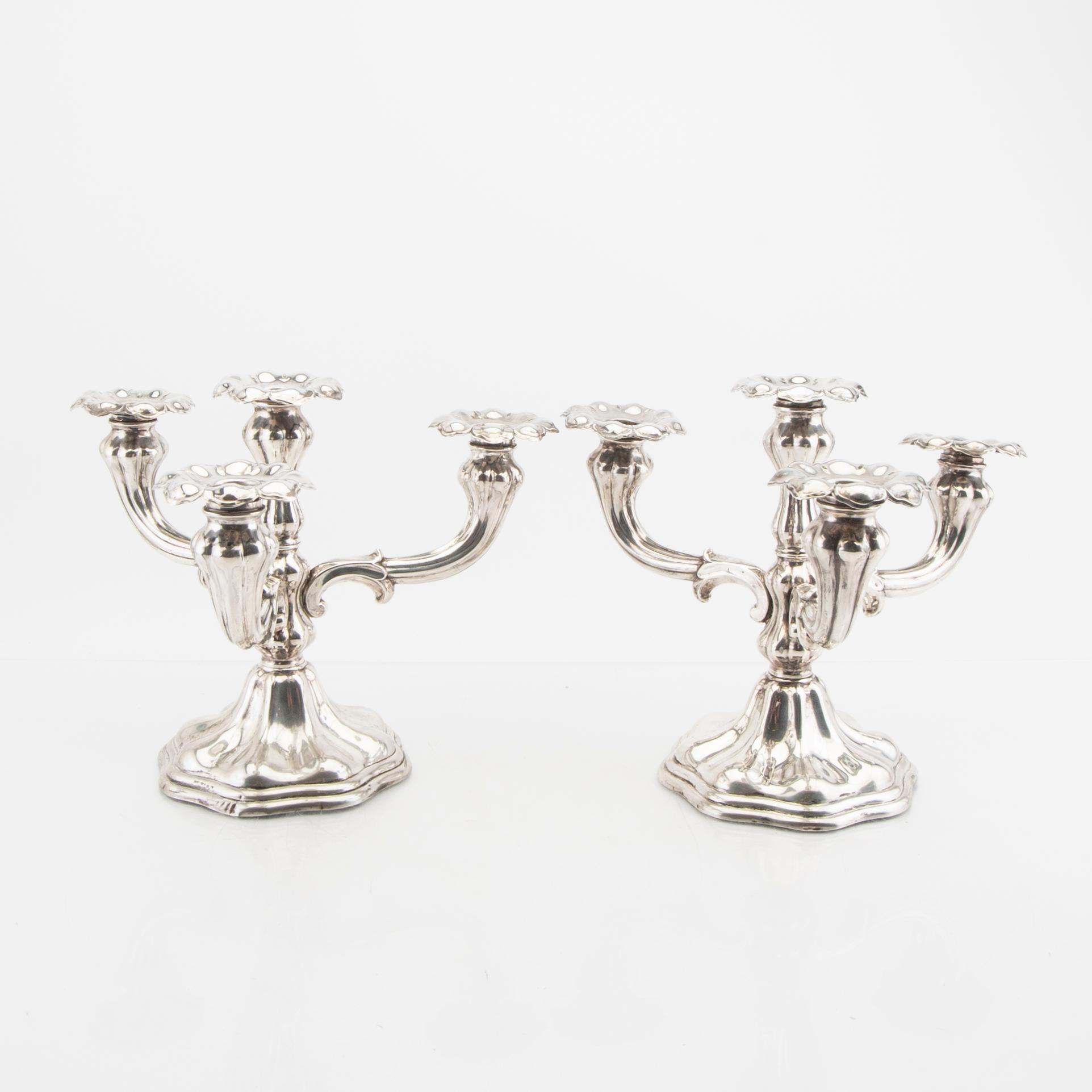 A Swdish 20th century pair of silver candelabra maark of CG Hallberg Stocholm 1946.