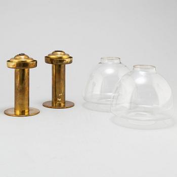 A pair of Hans-Agne Jakobson AB 20th century brass and glass lanterns for Lijeholmen candles  kupe 5:or no 131, Markaryd.