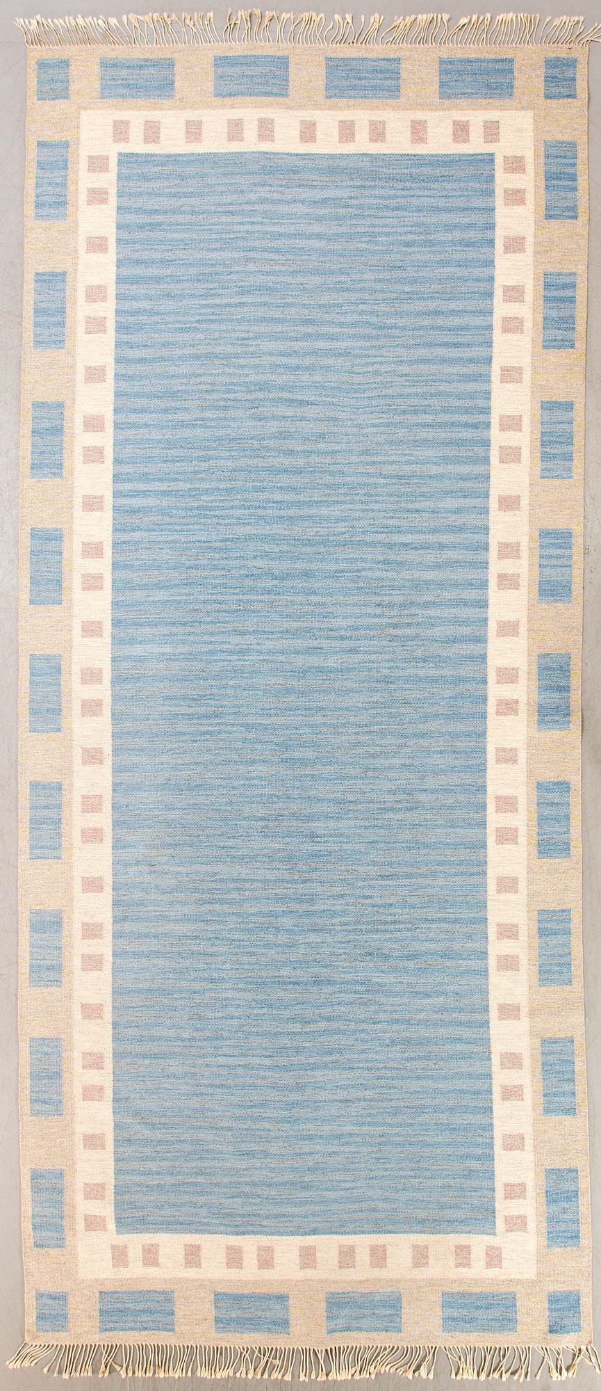 A 1950s Swedish flat weave carpet signed MÅ (Margareta Åkerberg) ca 460x201 cm.