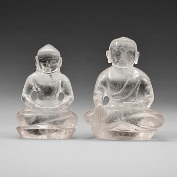 Two chinese rock chrystal figures of a seated buddha, circa 1900.