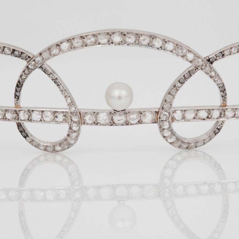 An Edwardian rose-cut diamond and pearl tiara with matching brooch.