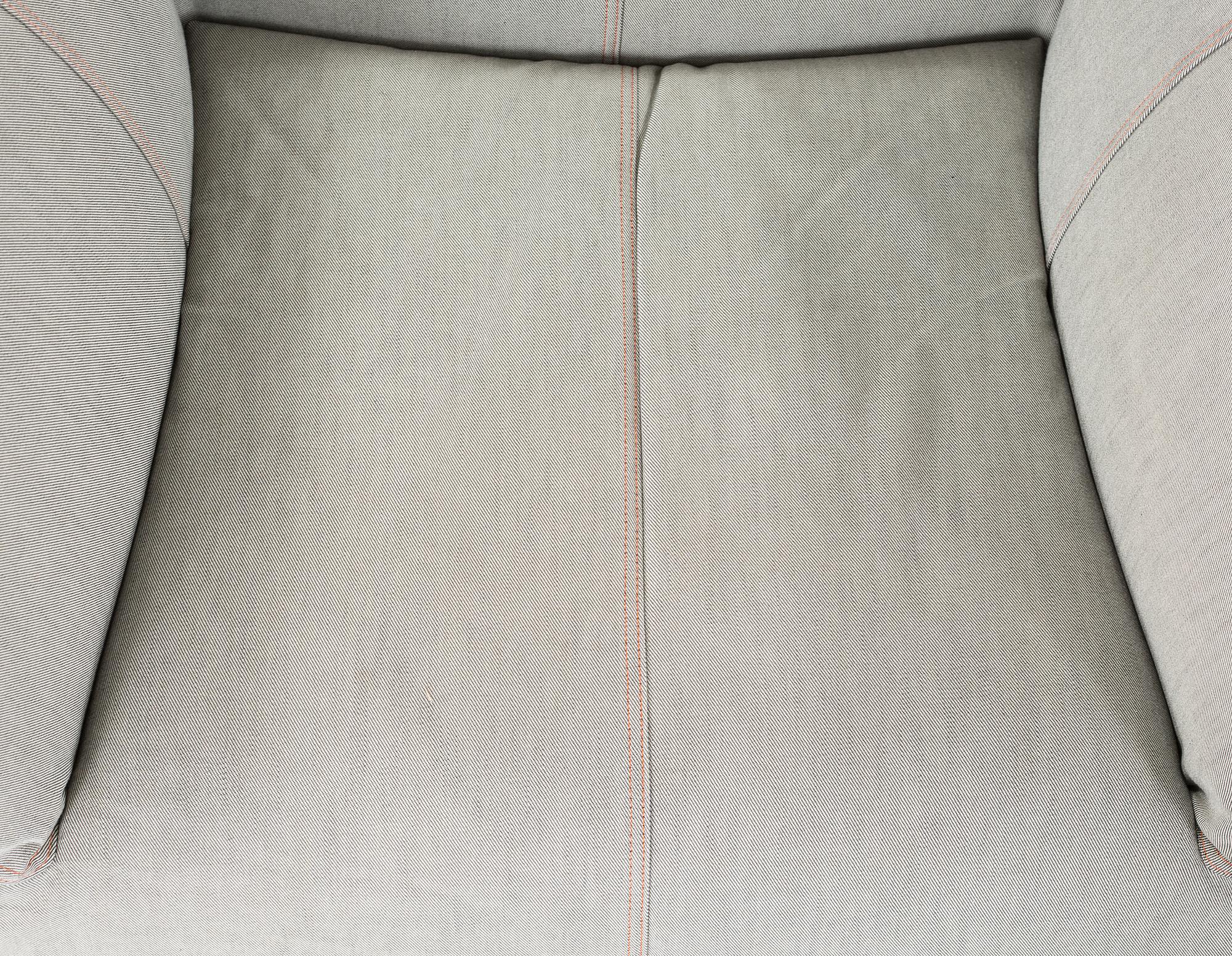 A "Le Bambole '07" armchair and a "Bambouff" footstool, designed by Mario Bellini, 21st century.