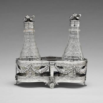 210. A Swedish 18th century silver and glass cruet-set, mark of Petter Eneroth, Stockholm 1780.