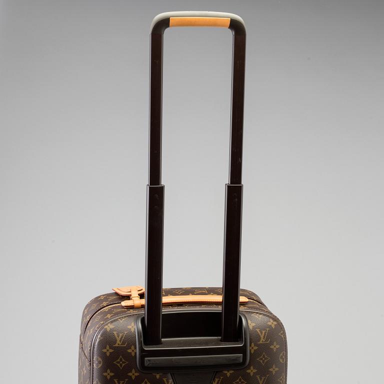 A Monogram Canvas "Zephyr" Suitcase by Louis Vuitton.