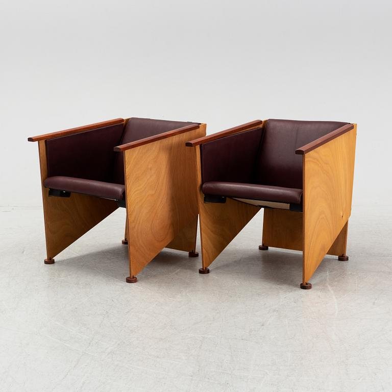 Torbjörn Ahlström, a pair of mahogany and cherry armchairs.