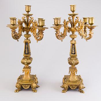 A pair of bronze candelabra from the latter half of the 19th Century.