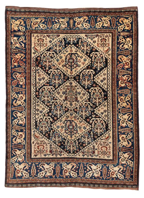 An antique Qashqai rug, South Persia, c. 189 x 142 cm.