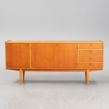 A second half of the 20th century teak veneered sideboard.