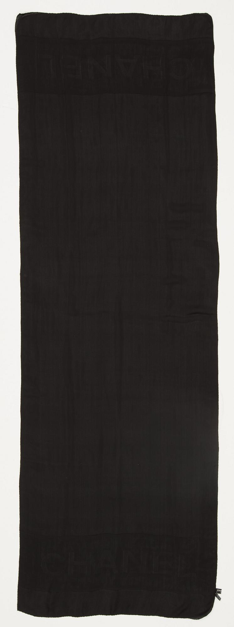 A silk scarf by Chanel.
