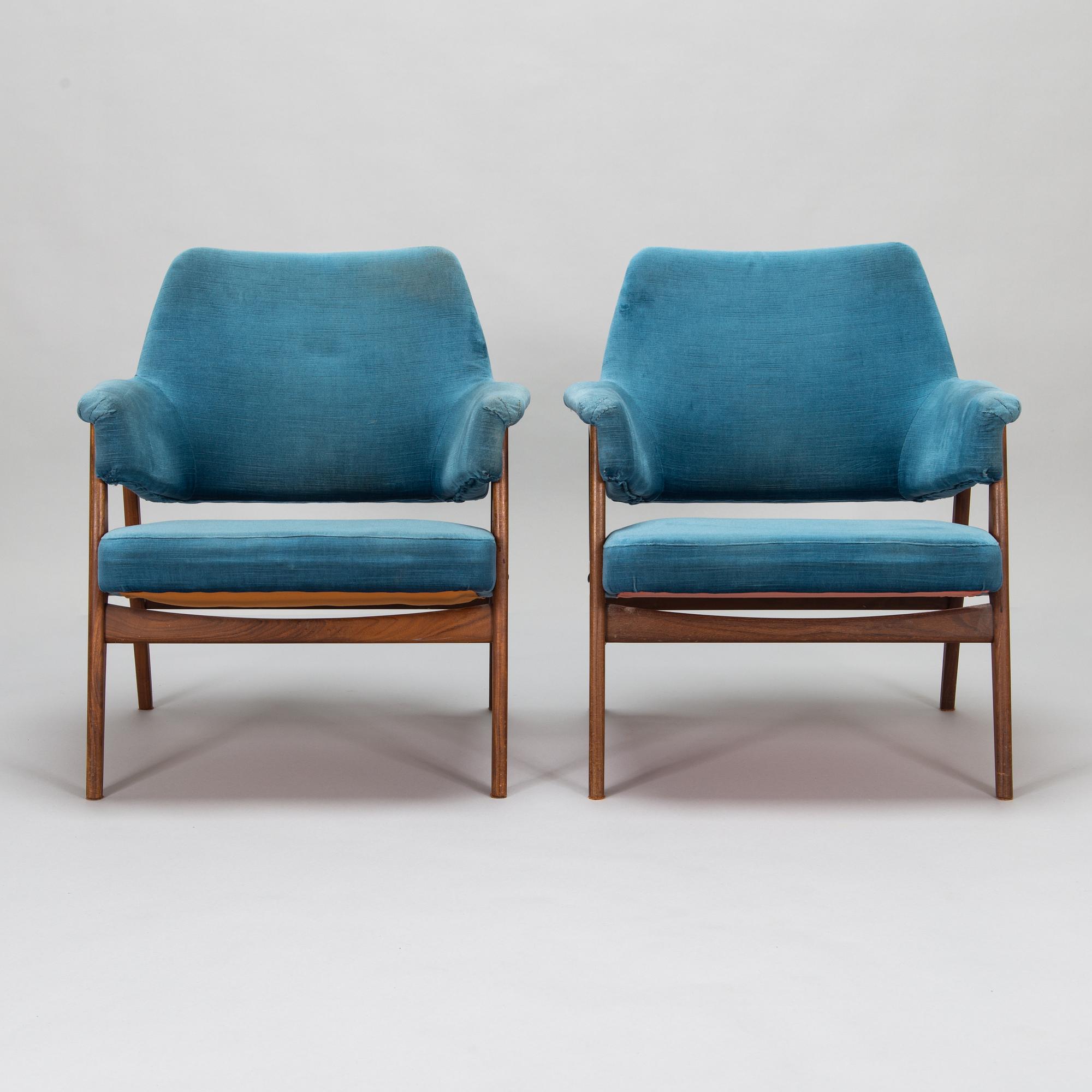 A pair of mid 20th century armchairs.