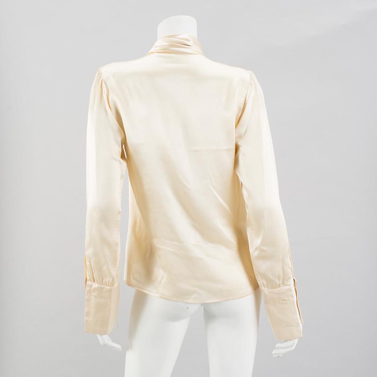 YVES SAINT LAURENT, tied blouses, 2 pieces, french size 40.