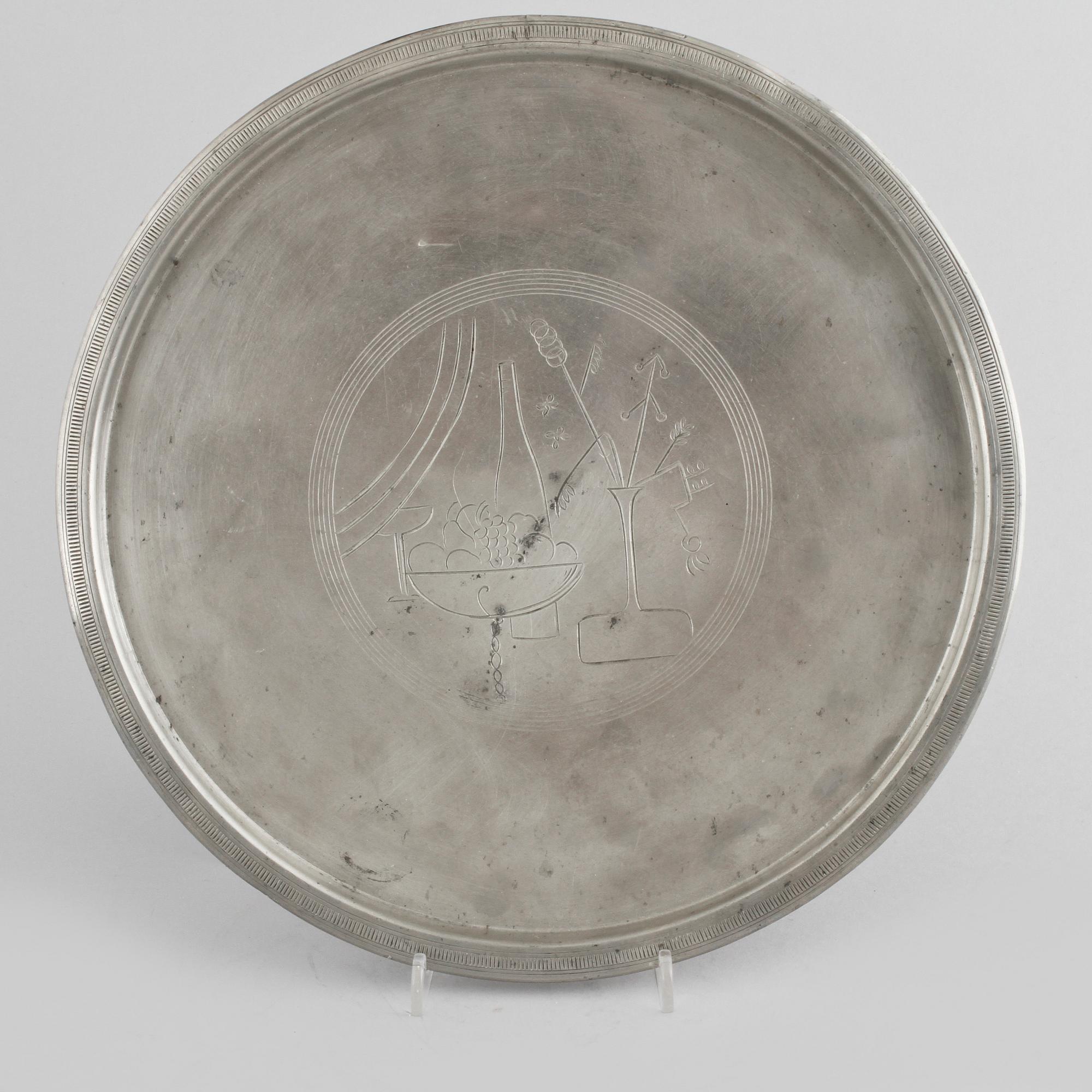 A tray in pewter, made by CG Hallberg in Stockholm, 1933.
