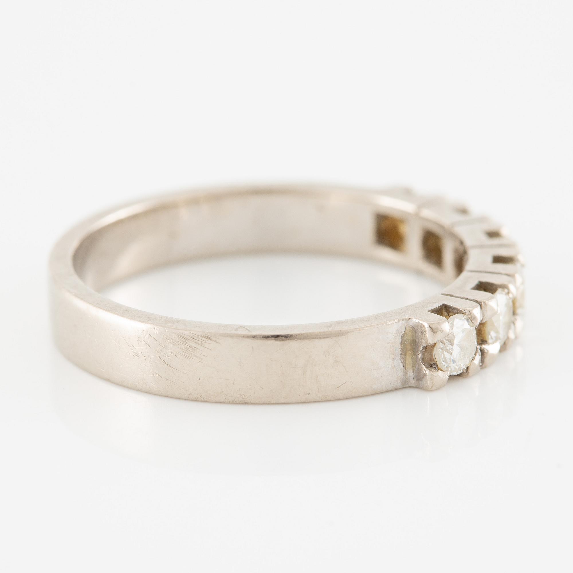 Ring, half eternity band in 18K white gold set with brilliant-cut diamonds.
