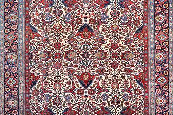A semi.antique Kashan, c. 319 x 212 cm.