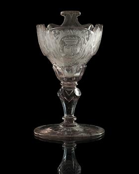 A cut and engraved armorial sweet meat glass, 18th Century.