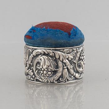 Tiffany & Co, a silver plated box with pin cushion lid.