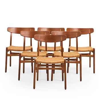 527. Hans J. Wegner, a set of six teak and rattan  'CH-23' chairs, Denmark 1950s.