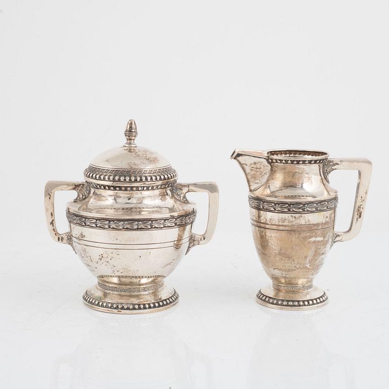 Sugar bowl and creamer, silver, 20th Century.