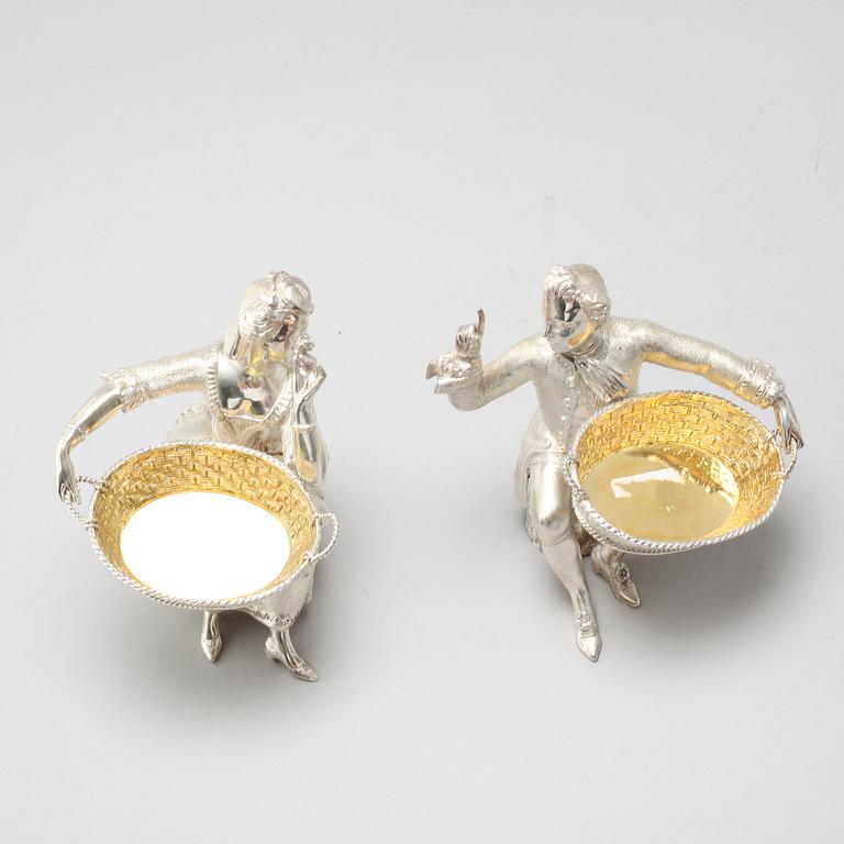 A pair of silver figurines bought at Garrard, London, 21th century.