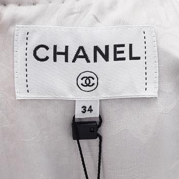 Chanel, a bouclé silver dress, size 34.