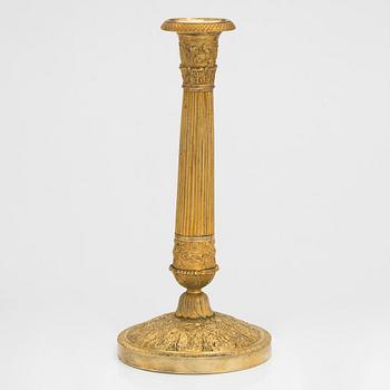 Ljusstake, brännförgylld brons, empire, 1800-talets första hälft.