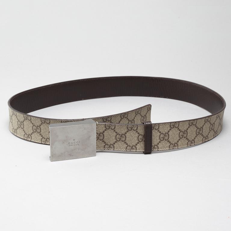 Two Gucci belts.