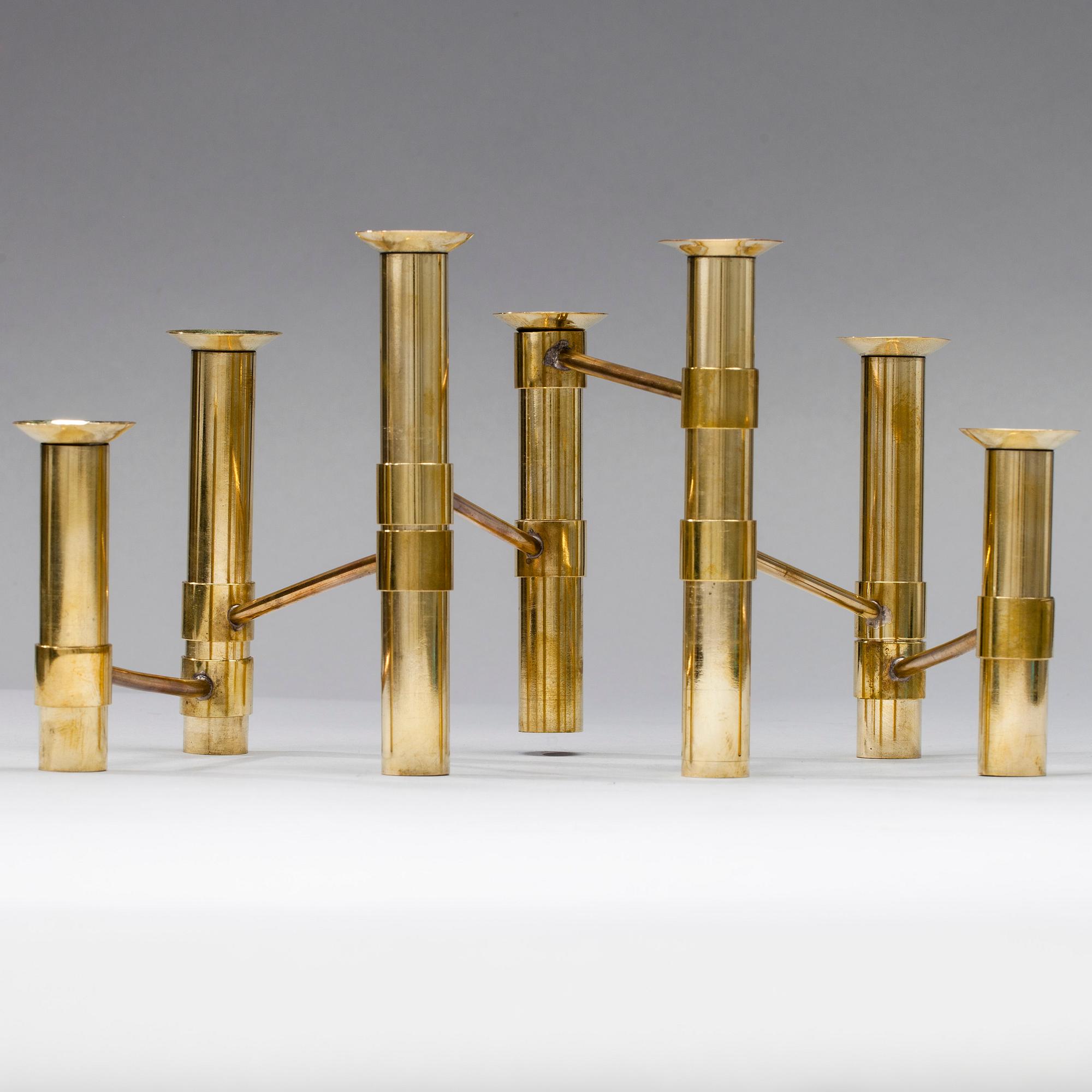 KANDELABER, "Serieljusstake Nonstop", mässing, design Tapio Wirkkala, Hopeakeskus 1970-tal.
