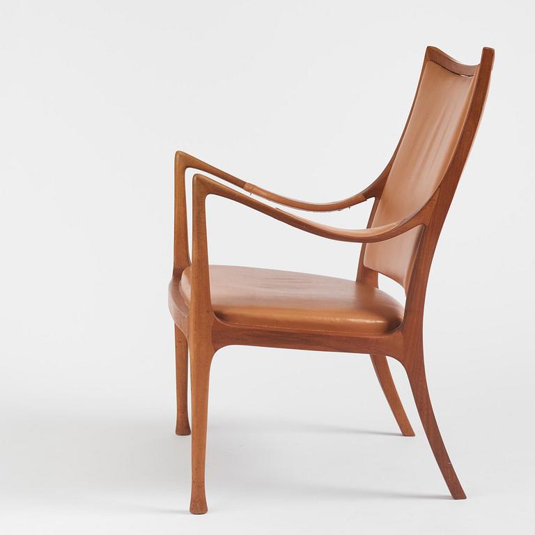 Hans Asplund, a walnut and leather easy chair, Nordiska Kompaniet, ca 1955, for the Nordiska Kompaniet beauty salon.