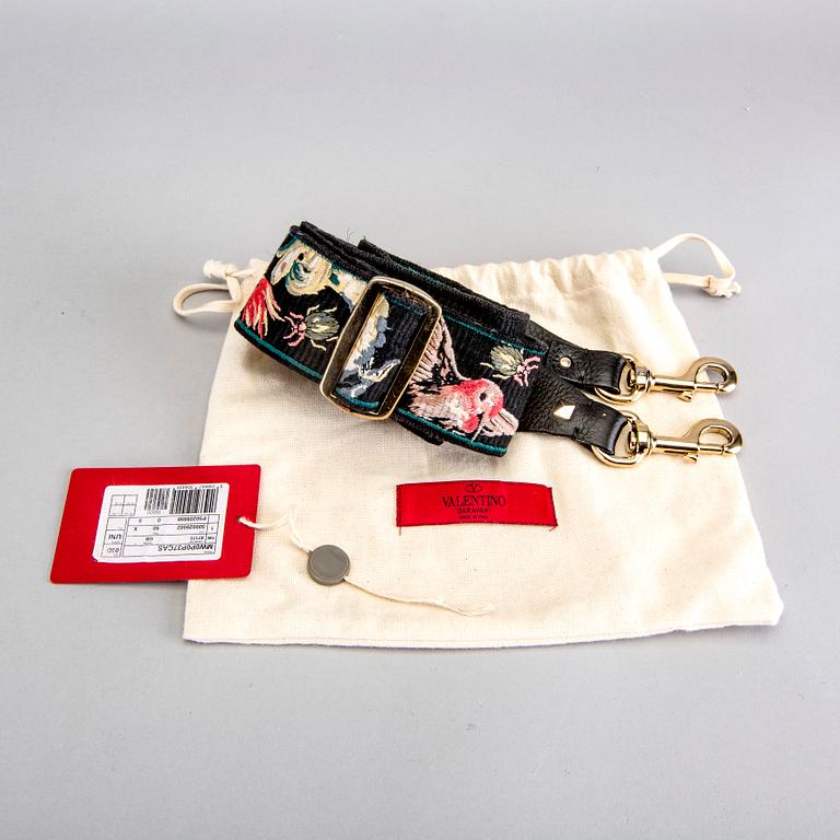 A Valentino strap.