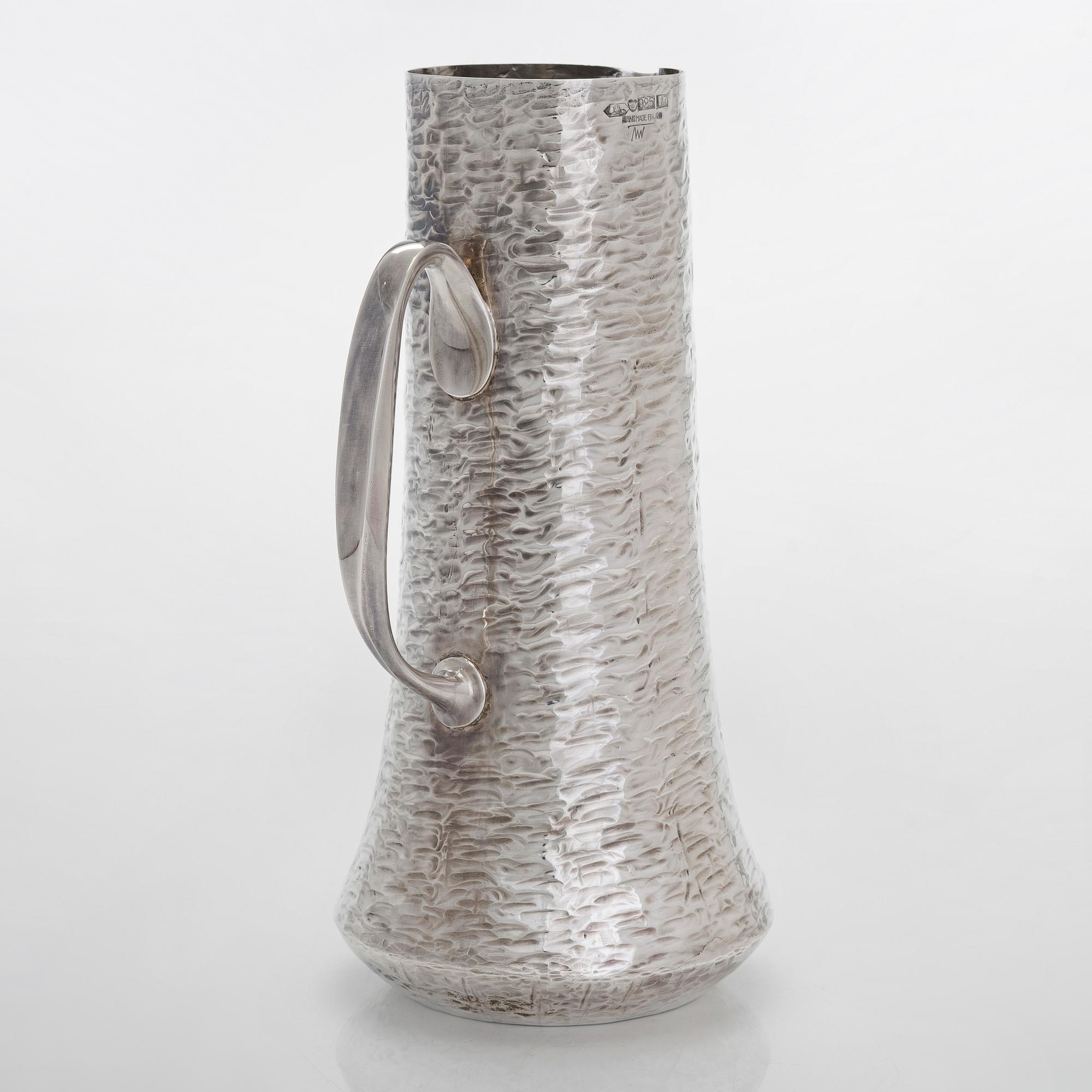 Tapio Wirkkala, a sterling silver pitcher with eight beakers, Hämeenlinna Finland 1973-1978.