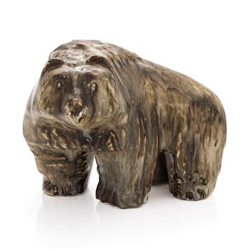 Taisto Kaasinen, a stoneware sculpture, signed T. Kaasinen Arabia Finland.