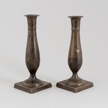 A pair of early 19th century empire pewter candlesticks.