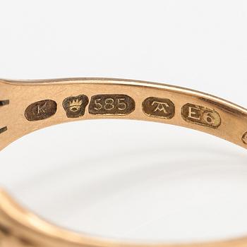 A 14K gold ring with a hematit. Turku 1934.
